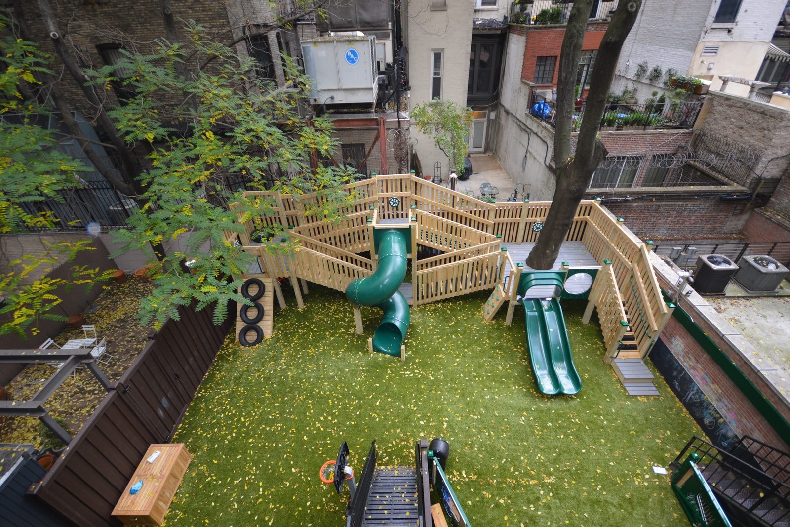 Finished: overview of the structure wrapping the courtyard trees.