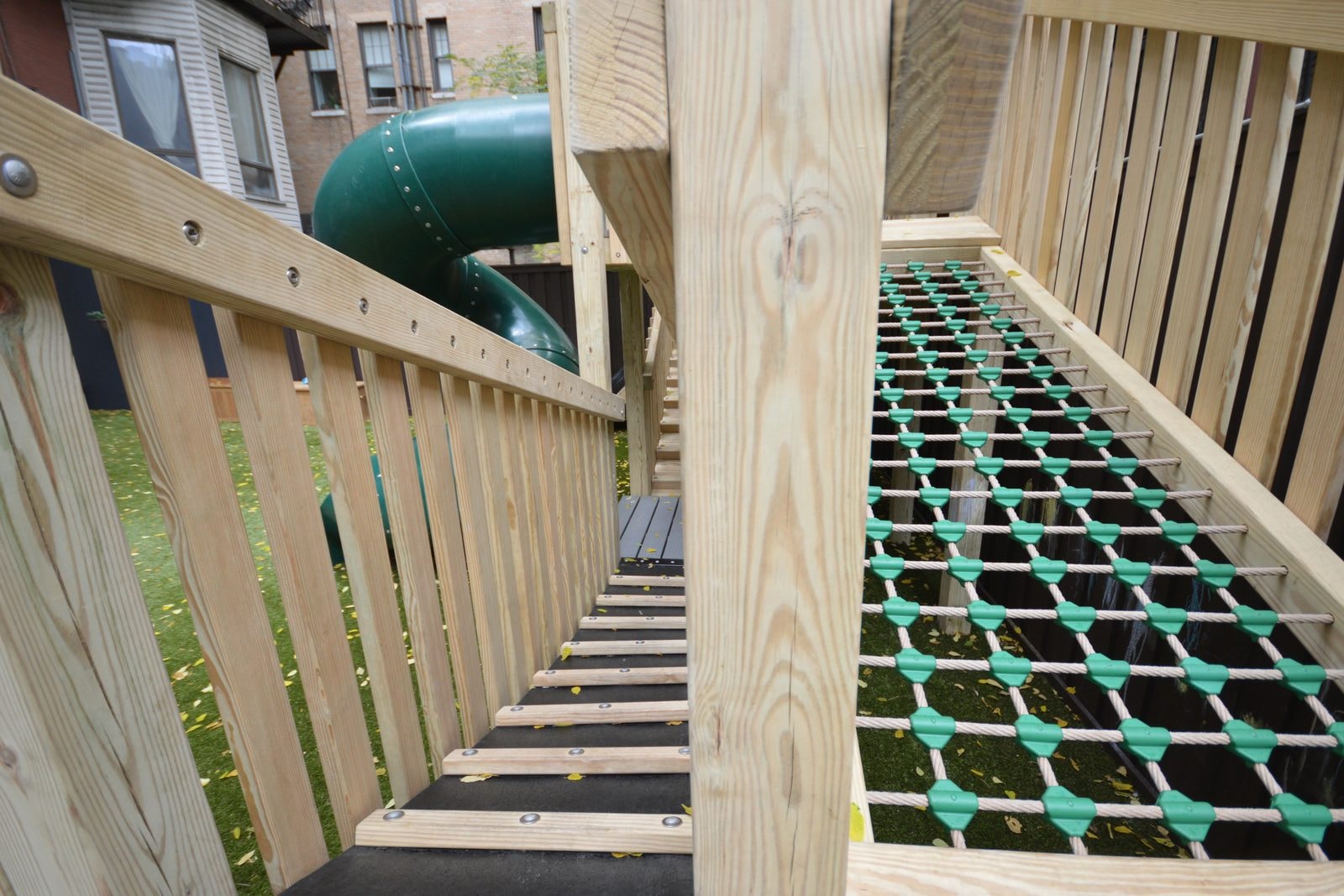 Finished: rope net climber between the deck railings.