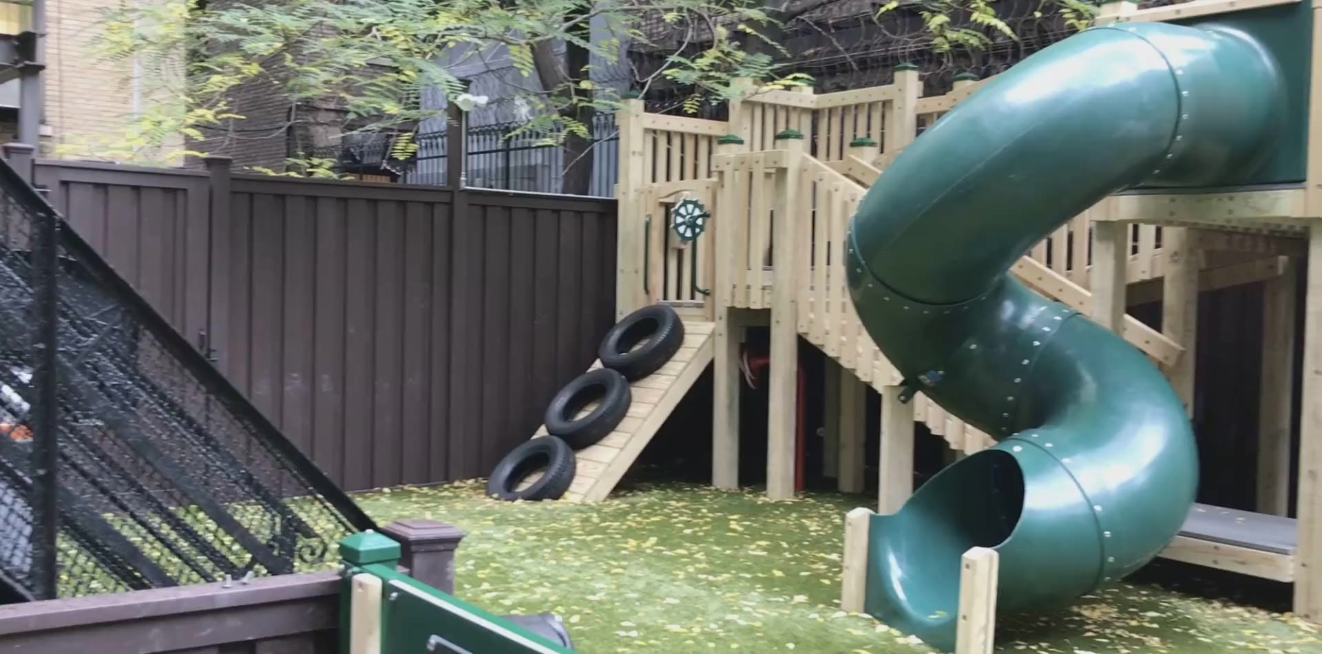 The natural wood courtyard playground at Children's All Day School in Manhattan.