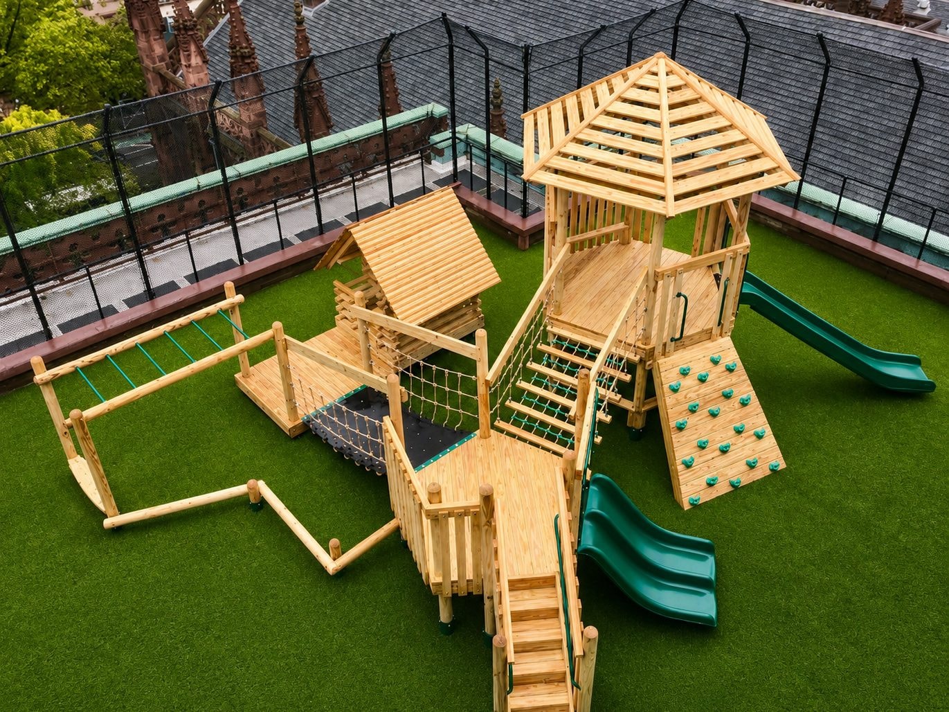 The finished natural wood structure seen from above on the church rooftop.