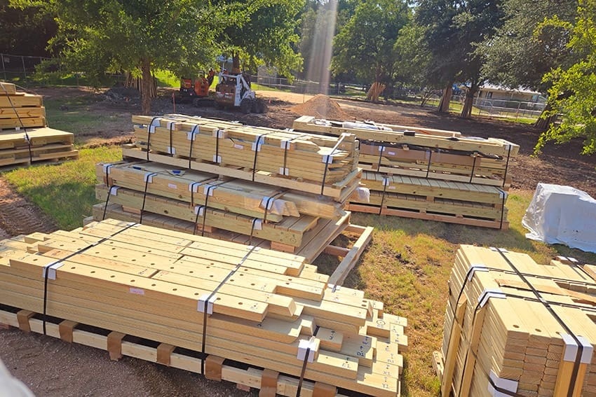 Bundled lumber stacked on site