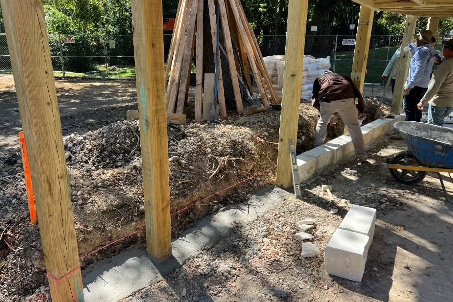 Posts and limestone blocks going in at the footings