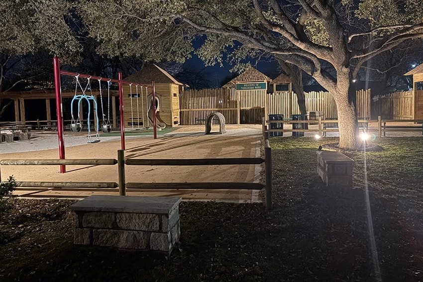 Swings and the fort at dusk